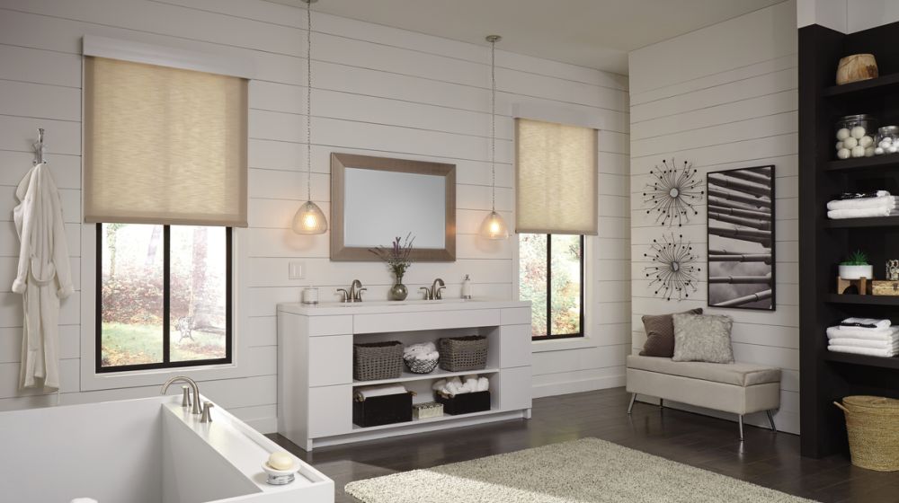 Motorized roller shades fitted to a bathroom window design